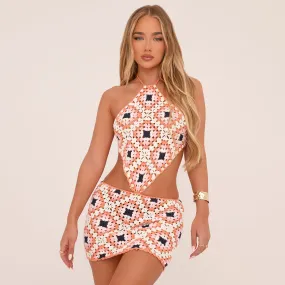 High Neck Open Back Crop Top And Low Rise Mini Skirt Co-Ord Set In Pink Printed Crochet Knit